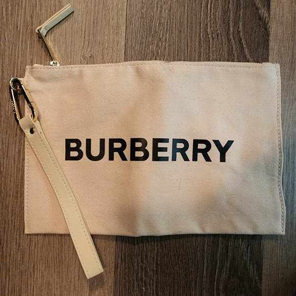 Burberry Handbags - Burberry Beige Clutch/ Perfume/cosmetics